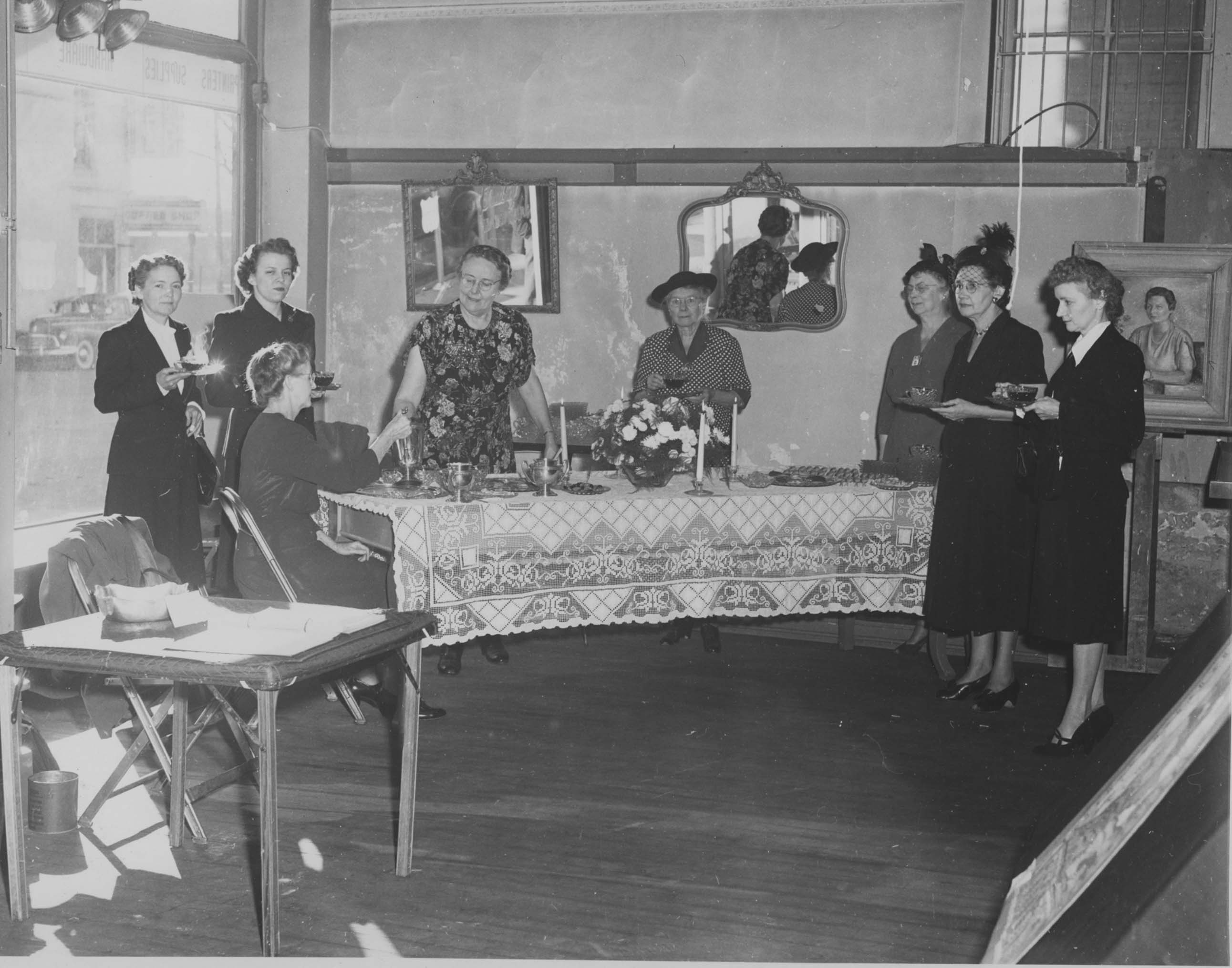 Women surrounding a table
